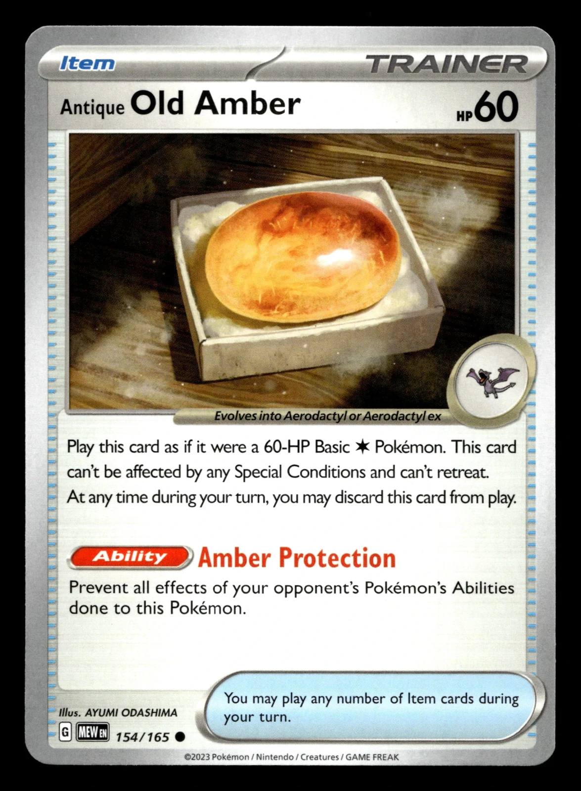 Voorkant Antique Old Amber 154/165 uit 151 Common Near Mint conditie Pokémon kaart productfoto
