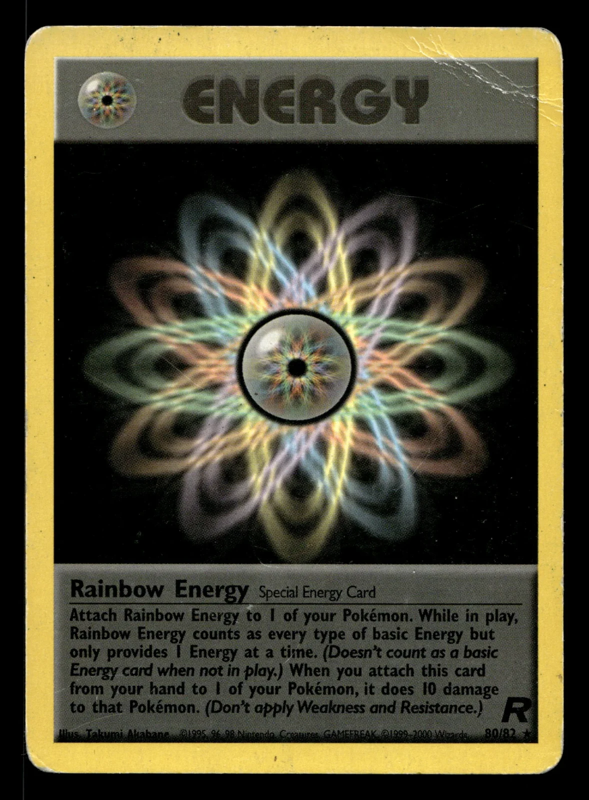 Voorkant Rainbow Energy 80/82 uit Team Rocket Rare Played conditie Pokémon kaart productfoto