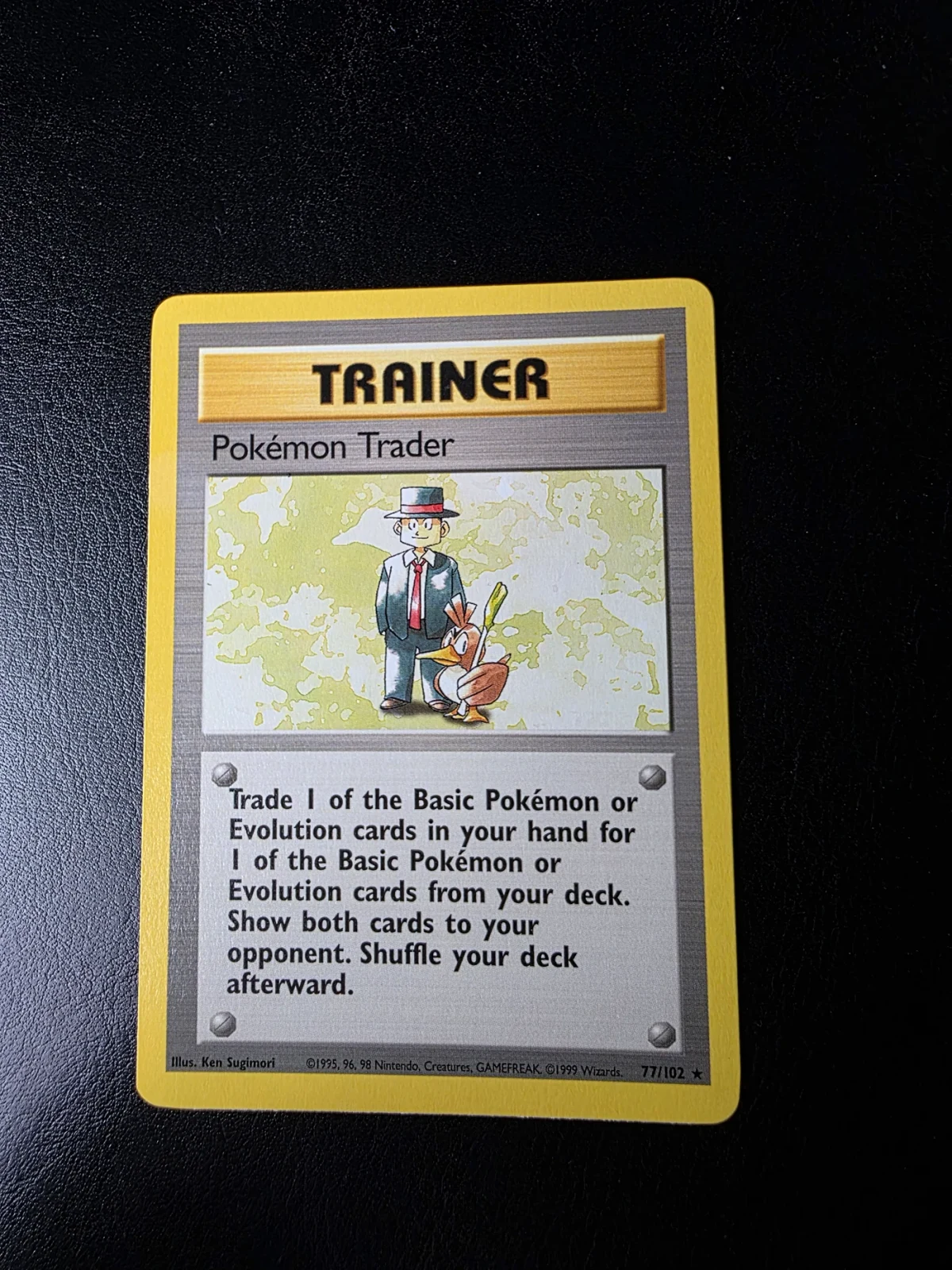 Voorkant Pokémon Trader 77/102 uit Base Set Rare Near Mint conditie Pokémon kaart productfoto NM 2/3